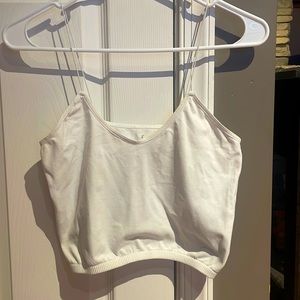 White Tank Top with sinched bottom and thin straps. No stains, good condition :)